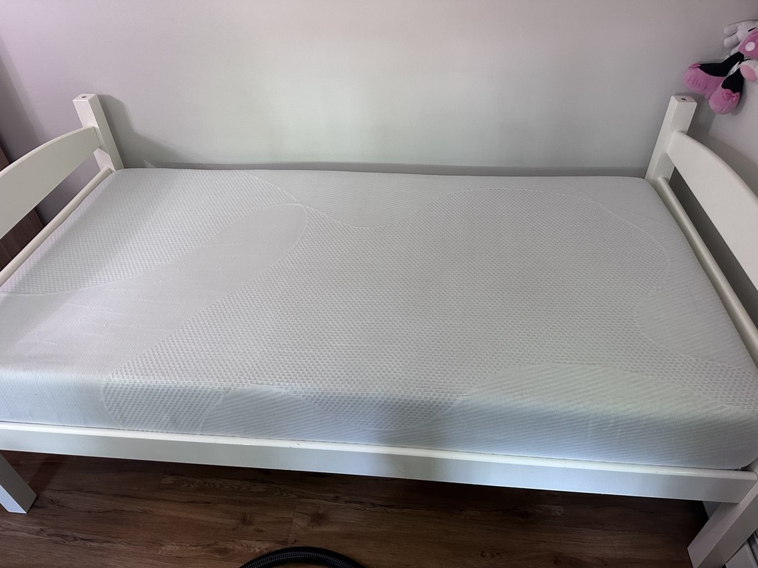 Same kids' mattress after cleaning